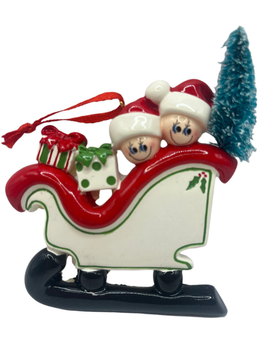 Couple in a Sleigh Christmas Tree Ornament