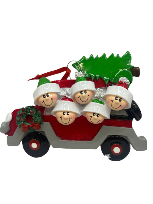 Family of 3 Collecting the Christmas Tree Ornament